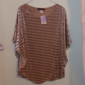 Is copper/brown colored blouse